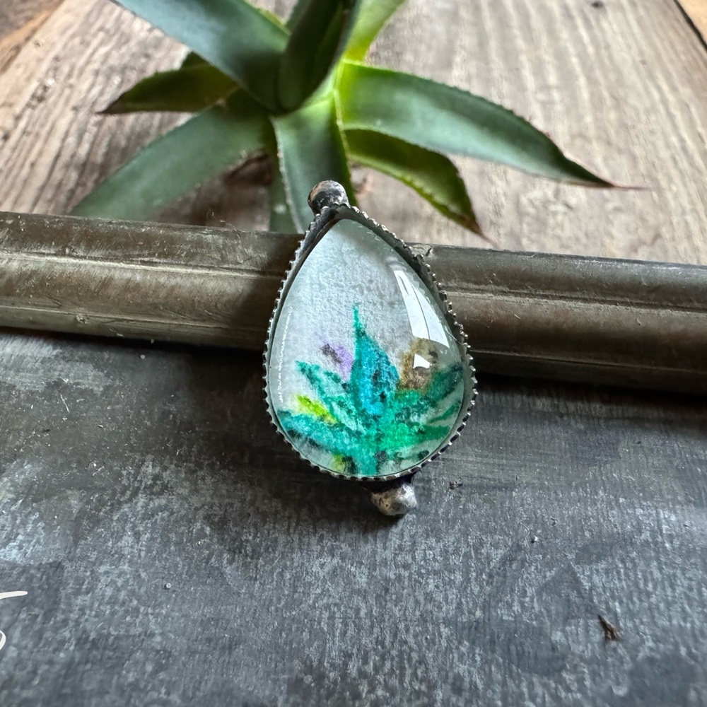 Silver Teardrop Pendant with Green and Purple Design